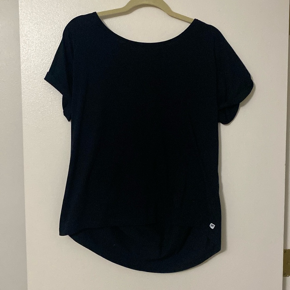 Fabletics tshirt with cut out detail and cuffed sleeves.